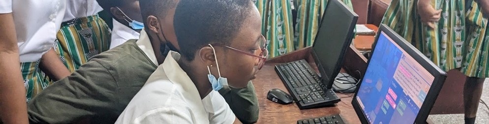 student working at a computer