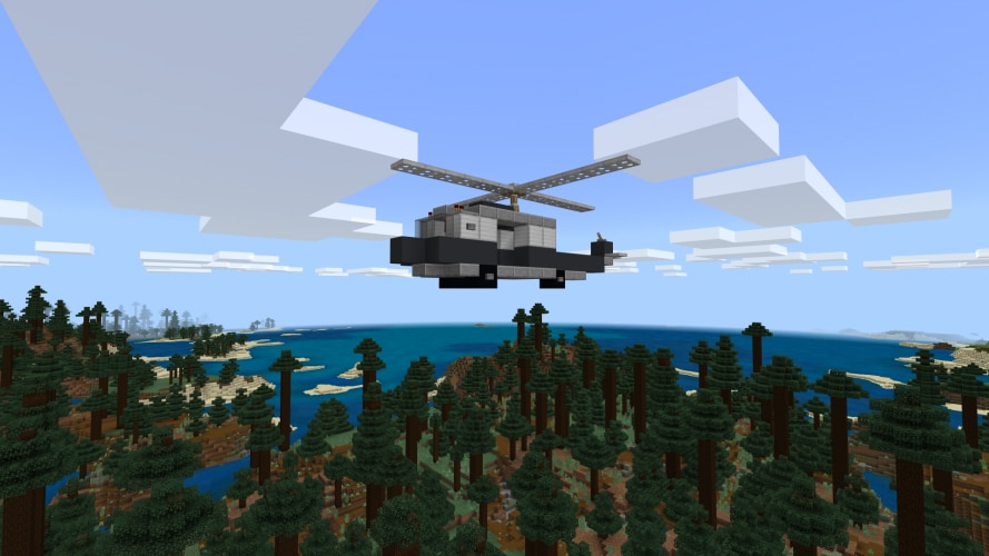 A helicopter flies over forest